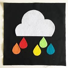 Cloud with colorful rain drops