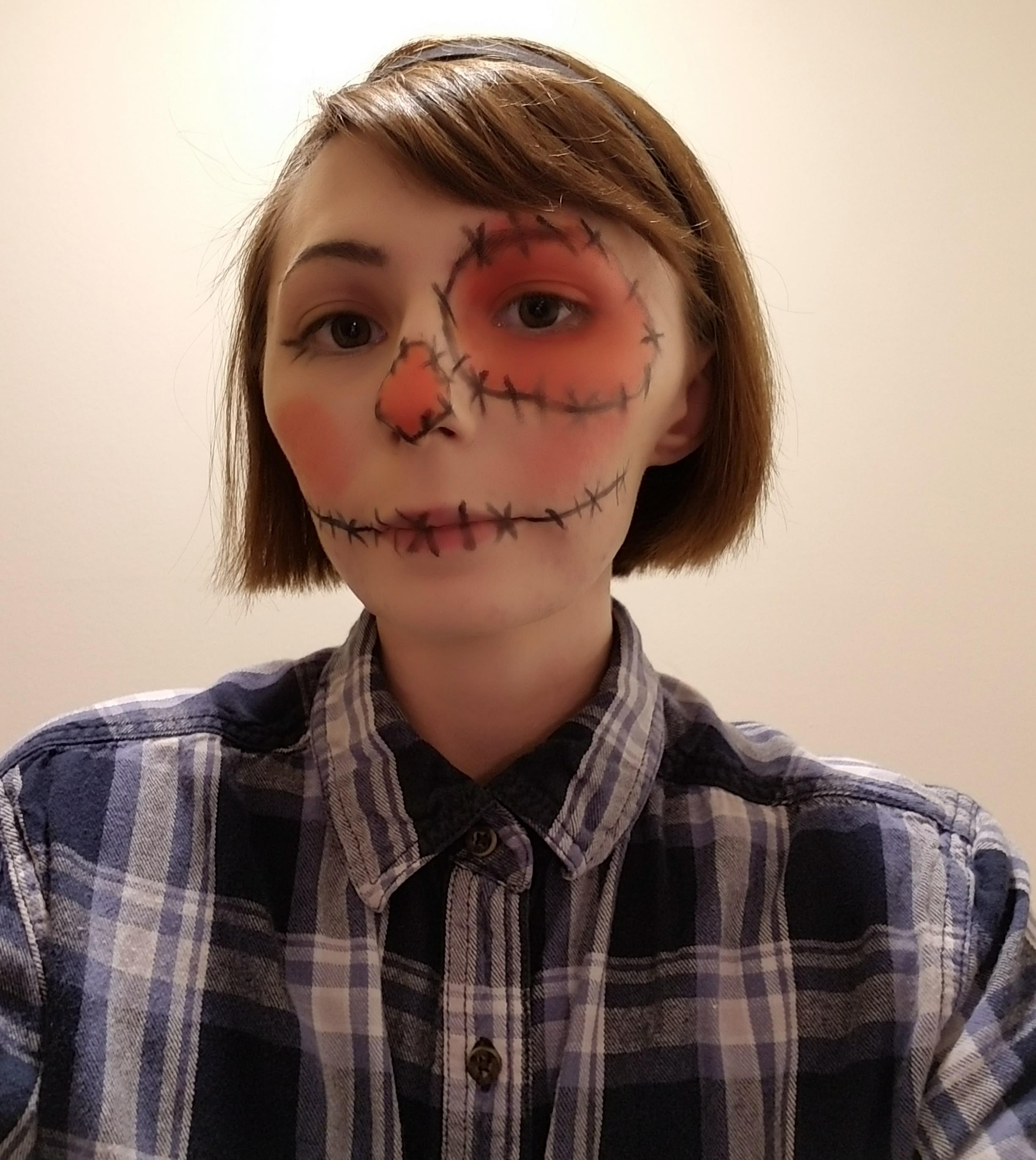 A photo of the author with makeup done to look like a scarecrow, taken for the tween makeup class.