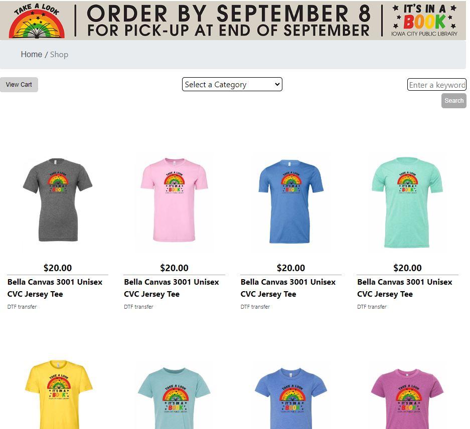 screen shot of the online store of "Take a look, it's in a book!" tees in a variety of colors